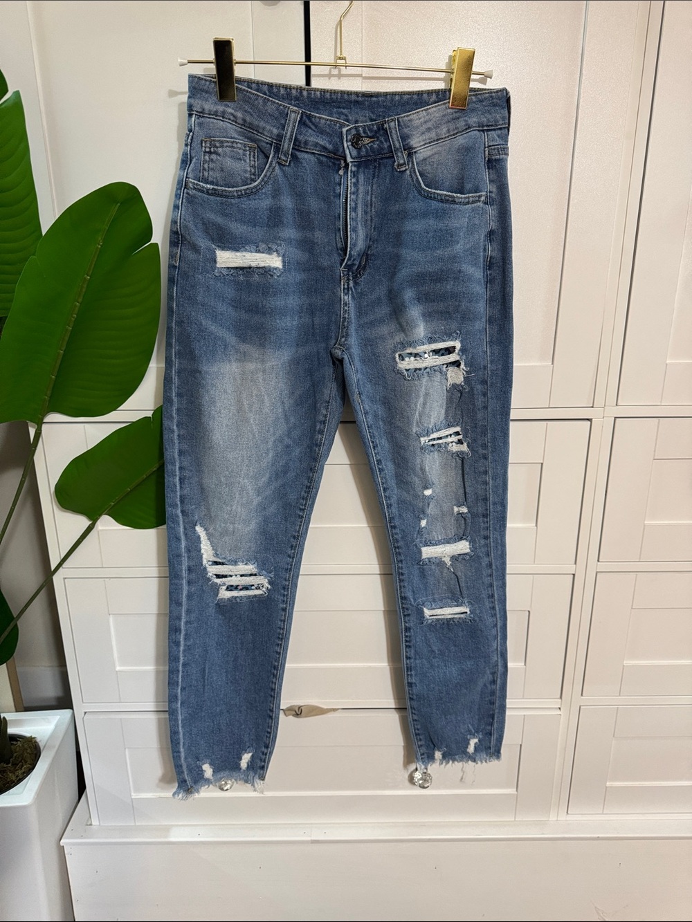 Amazon Women's Blue Ripped Ankle Jeans